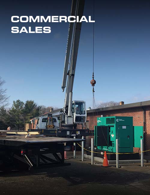 crane installing commercial generator