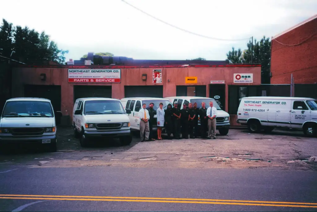 Northeast Generator vans and employees outside of business