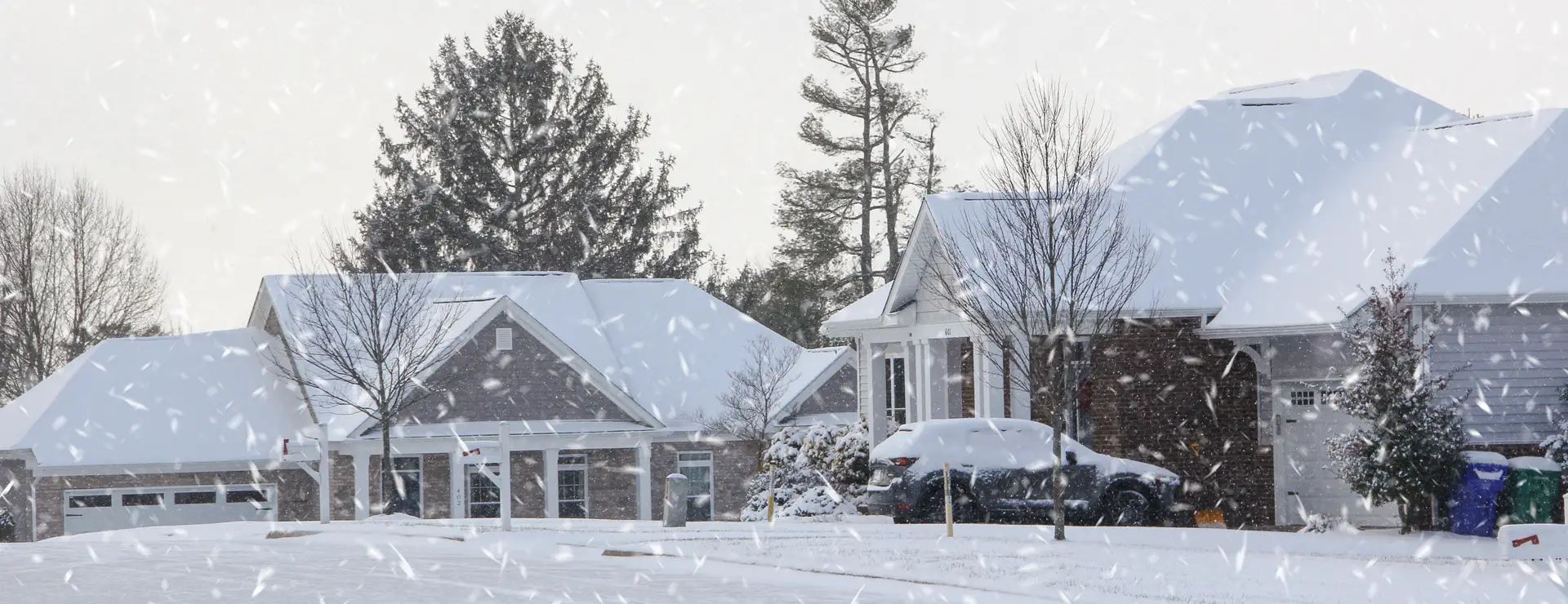 residential area with snow on houses