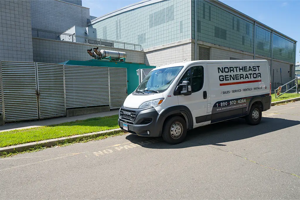 Northeast Generator service van parked outside a commercial building