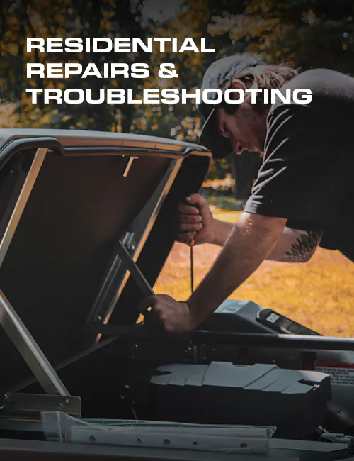 technician repairing generator